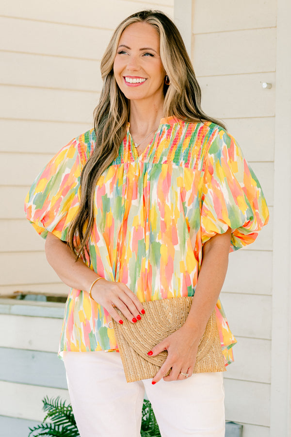 Chic Soul Plus size clothing, pink watercolor top with bubble sleeves an a textured neckline 