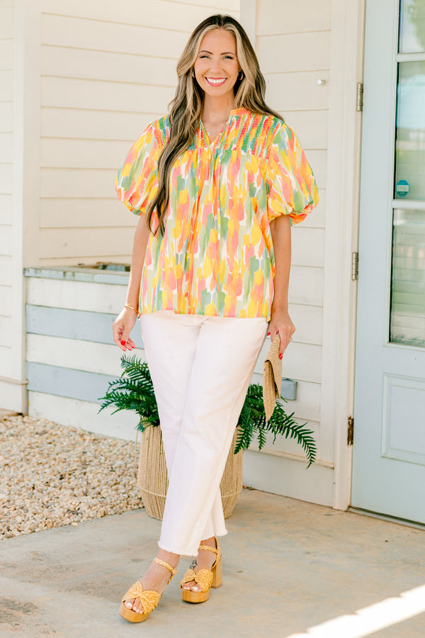 Chic Soul Plus size clothing, pink watercolor top with bubble sleeves an a textured neckline