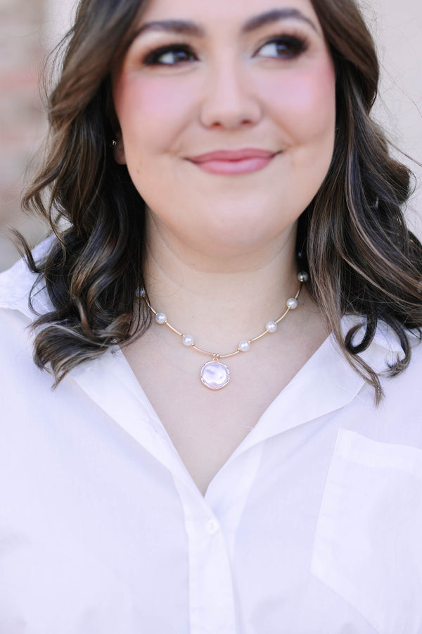 Plus size clothing, pearl and gold necklace