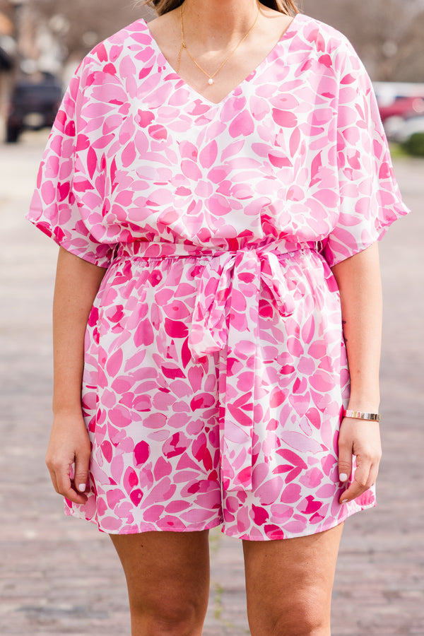Chic Soul plus size clothing, pink short sleeve romper with floral pattern with v neckline and tie waist detail