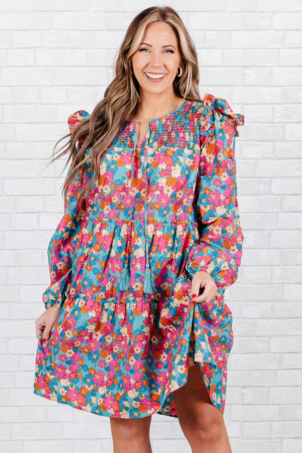 Chic Soul plus size clothing, Puff sleeve knee length dress in mint pink, with pink, blue, and orange floral design with ruching along neck and tie detail