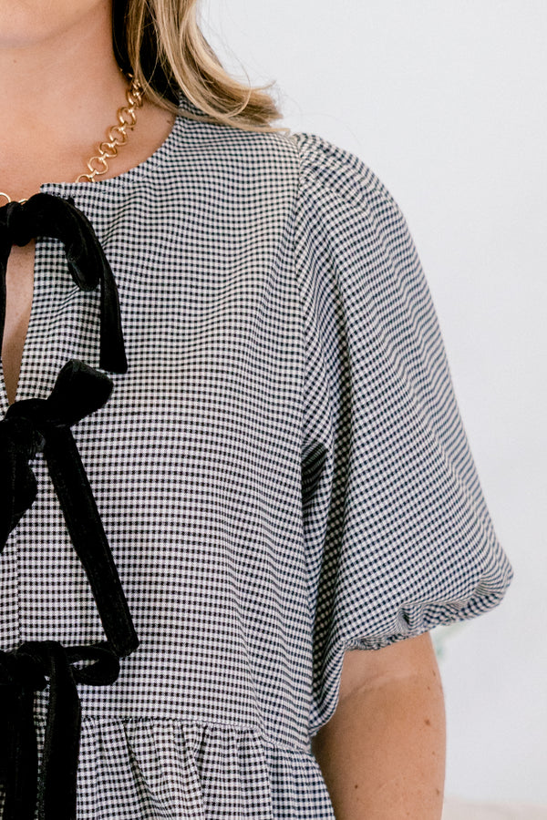 Chic Soul plus size clothing, black and white small gingham print baby doll puff short sleeve top with three black bow ties along the front
