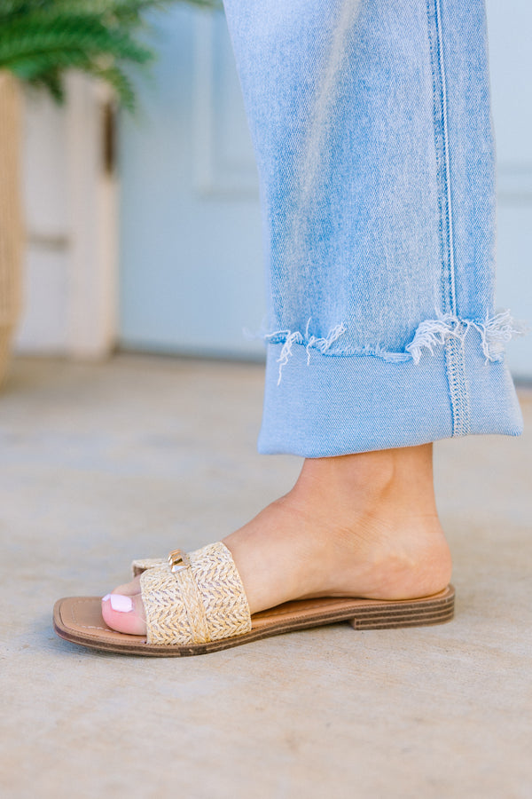 Chic Soul plus size clothing, backless slip-on natural tan sandals with a woven detailing and gold accents on the top with a brown sole 