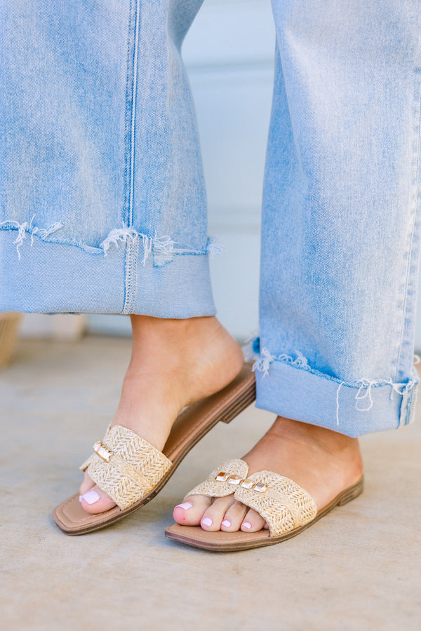 Chic Soul plus size clothing, backless slip-on natural tan sandals with a woven detailing and gold accents on the top with a brown sole 