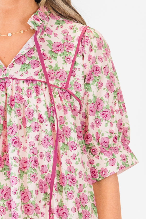 Chic Soul plus size clothing, pink short sleeve mini dress with v cutout along neckline with collar detail with tie with floral pattern