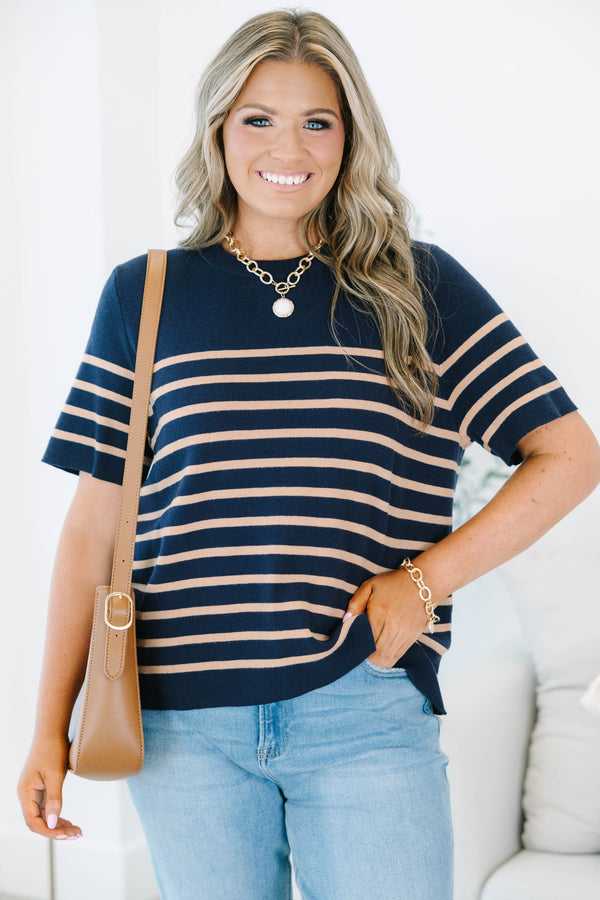 Plus size navy short-sleeve knit sweater with brown horizontal stripes and a ribbed crew neckline.