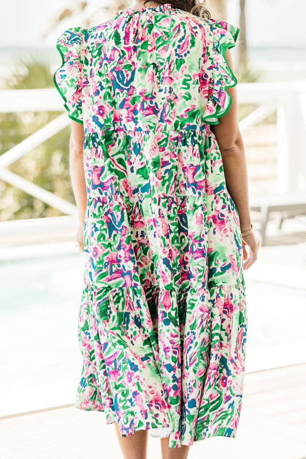 Chic Soul plus size clothing, short-flutter-sleeve green ruffled baby doll midi dress with a split-v-neckline and solid green tassels with a pink and white abstract watercolor floral pattern 