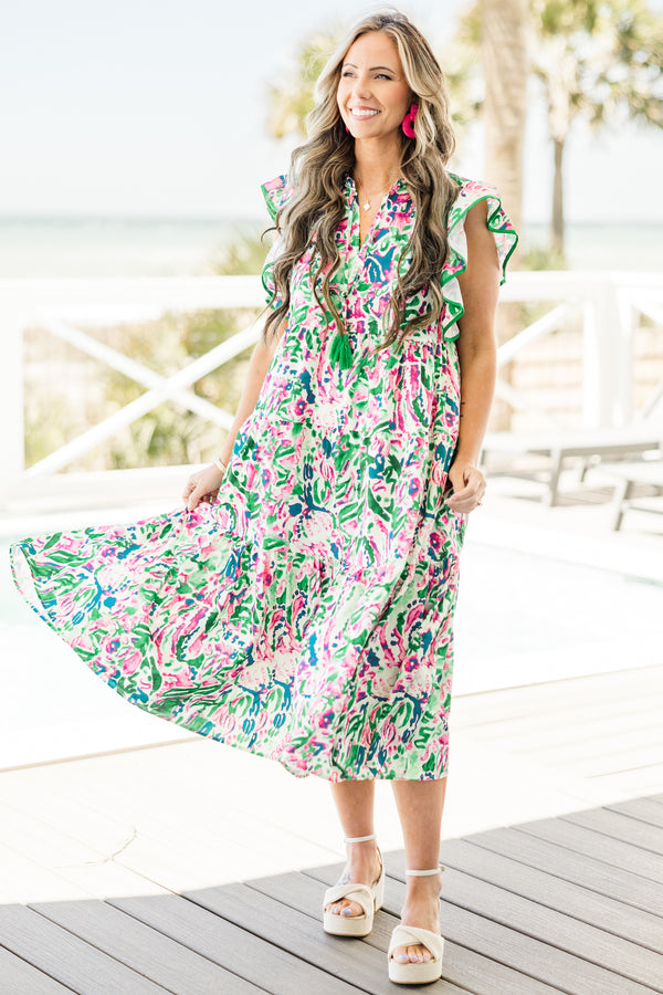 Chic Soul plus size clothing, short-flutter-sleeve green ruffled baby doll midi dress with a split-v-neckline and solid green tassels with a pink and white abstract watercolor floral pattern 