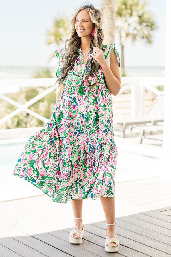 Chic Soul plus size clothing, short-flutter-sleeve green ruffled baby doll midi dress with a split-v-neckline and solid green tassels with a pink and white abstract watercolor floral pattern 
