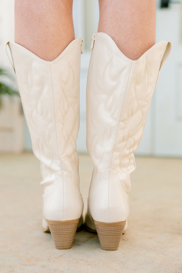 Chic Soul plus size clothing, bone white faux leather cowboy boots with an off-white stitching and a pointed toe with a light brown heel and a zipper on the side 