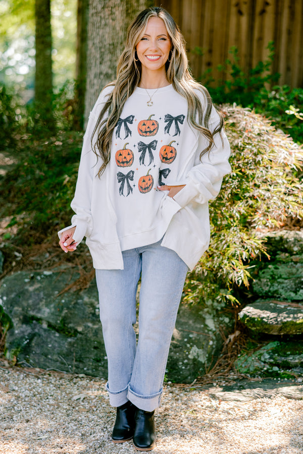 Chic Soul plus size clothing, ivory long sleeve crewneck with orange pumpkins and black bows in a square graphic 