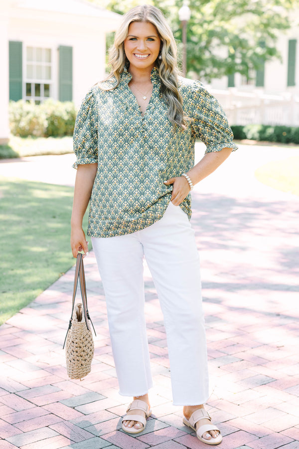 Plus Size green floral print top with puff sleeves, a ruffled collar, and a button-down neckline.