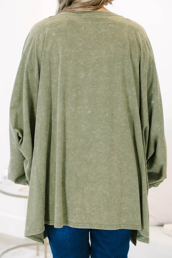 Plus size olive mineral wash tunic with a flowy high-low hem and long sleeves.