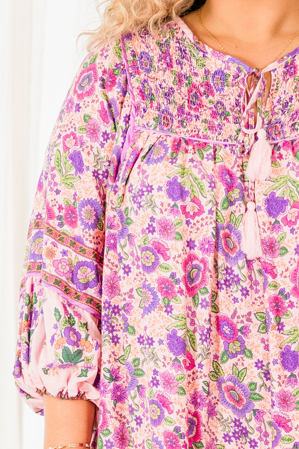 Chic Soul plus size clothing, pink quarter sleeve flowy dress with pink floral pattern and tassels on the neckline