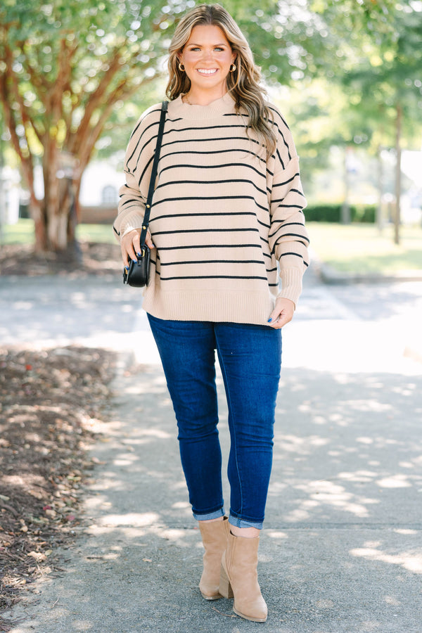 Plus size khaki and black striped knit sweater with a relaxed fit and ribbed crew neckline.