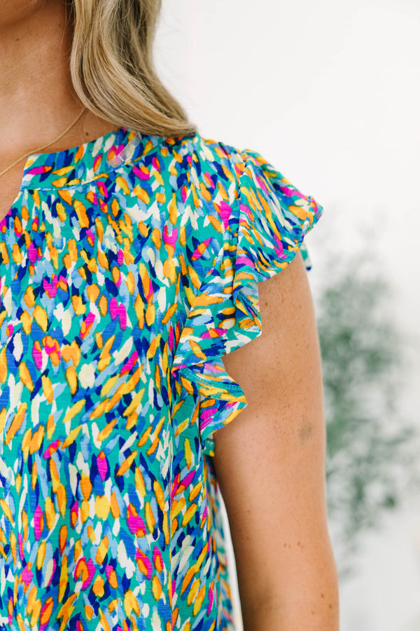 Chic Soul plus size clothing, blue multi abstract print short sleeve top with v cutout along neckline with ruffle detail on sleeves