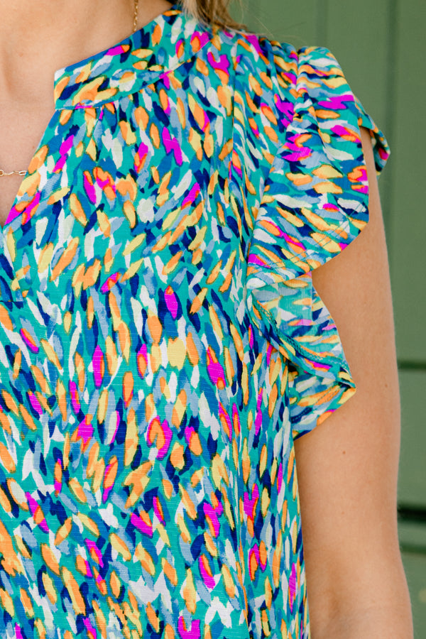 Chic Soul plus size clothing, blue multi abstract print short sleeve top with v cutout along neckline with ruffle detail on sleeves