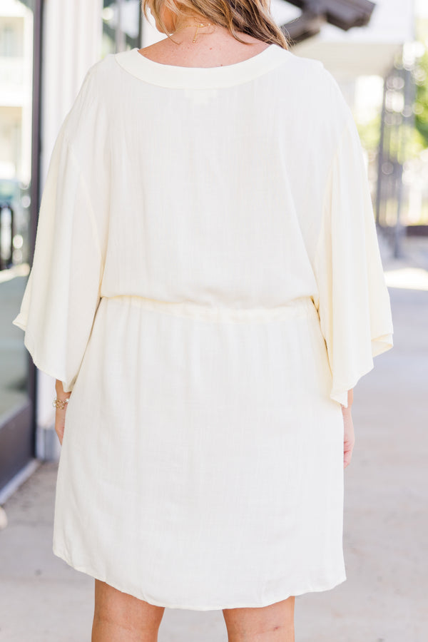 Plus Size ivory linen-blend babydoll dress with a V-neckline, button-down front, and tie waist.
