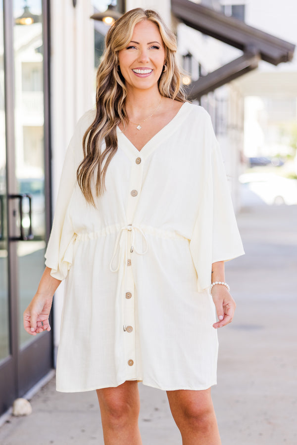 Plus Size ivory linen-blend babydoll dress with a V-neckline, button-down front, and tie waist.