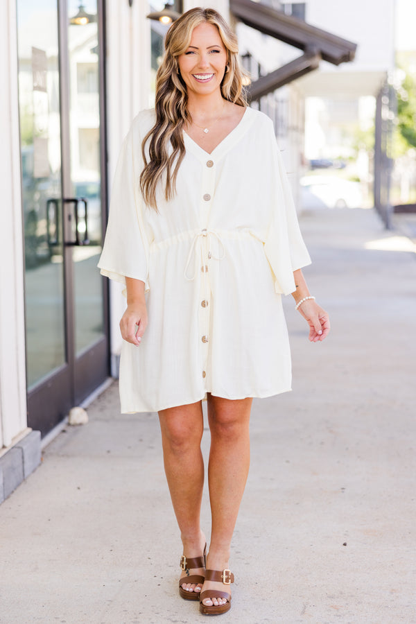 Plus Size ivory linen-blend babydoll dress with a V-neckline, button-down front, and tie waist.