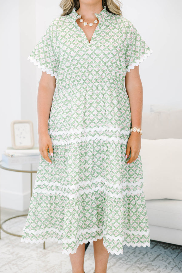 Plus size green and white patterned Maxi Dress with a flowy tiered skirt.