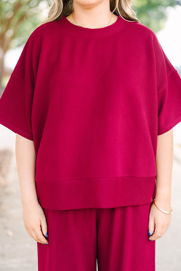 Plus Size red two-piece set with a ribbed short-sleeve crewneck top and matching wide-leg pants.
