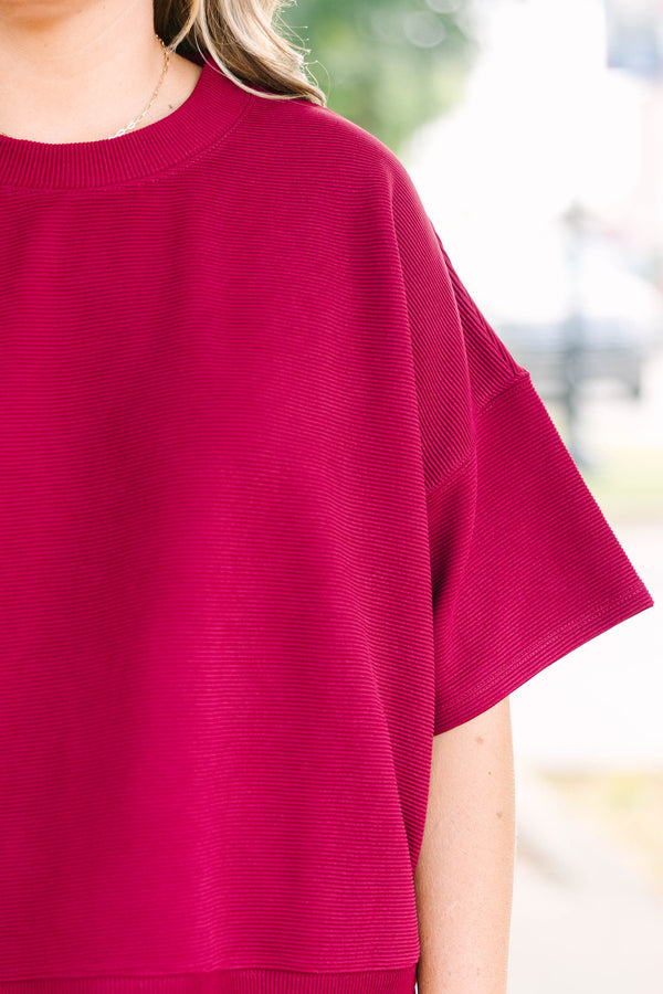 Plus Size red two-piece set with a ribbed short-sleeve crewneck top and matching wide-leg pants.