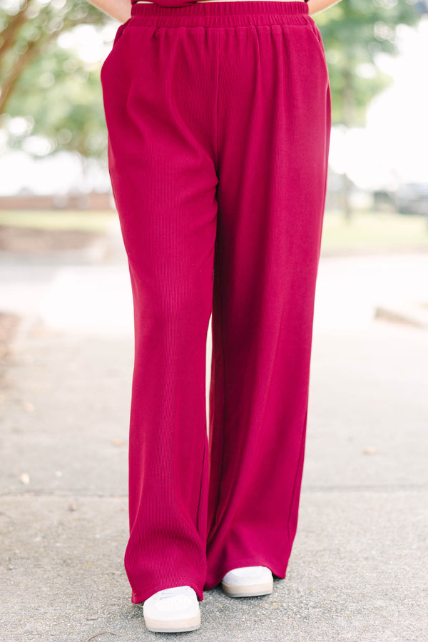 Plus Size red two-piece set with a ribbed short-sleeve crewneck top and matching wide-leg pants.