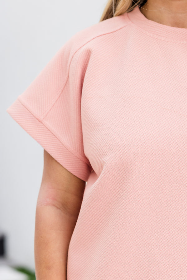 Plus Size pink crew neck top with short sleeves and embossed fabric texture with matching shorts.
