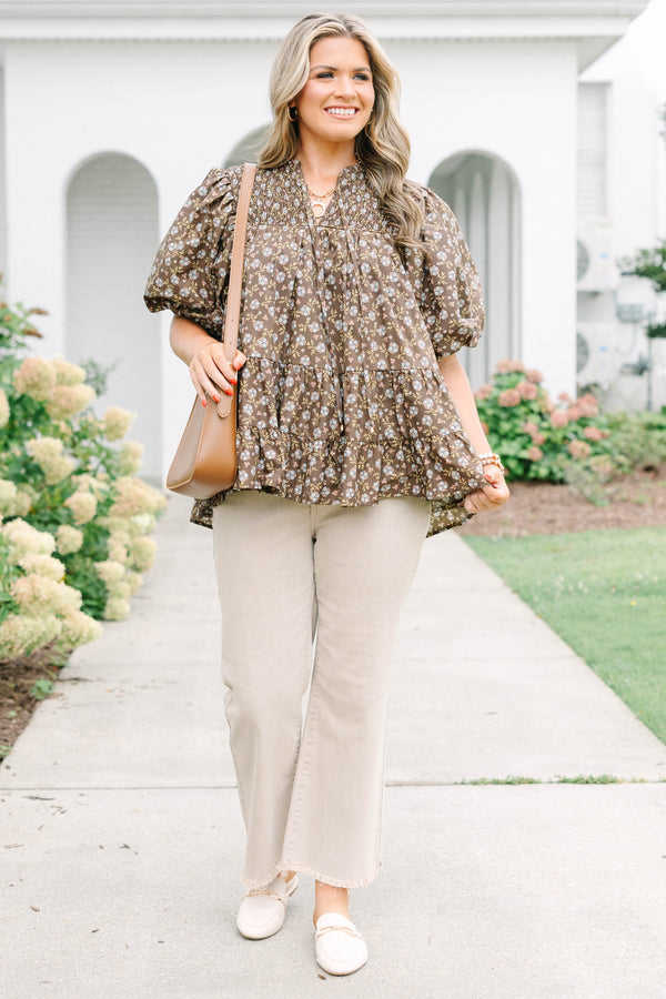 Plus Size brown floral babydoll top with smocked split v-neck, tassels, and elastic puff sleeves.