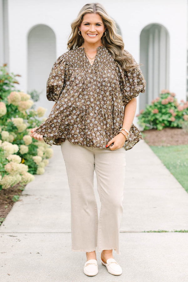 Plus Size brown floral babydoll top with smocked split v-neck, tassels, and elastic puff sleeves.