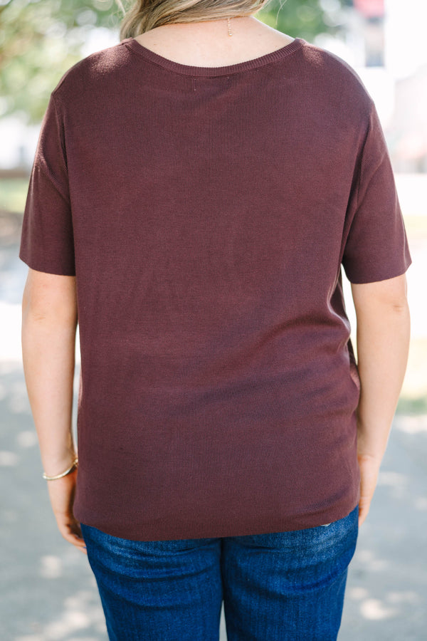 Plus Size short sleeve brown knit sweater with a round neckline and relaxed fit.