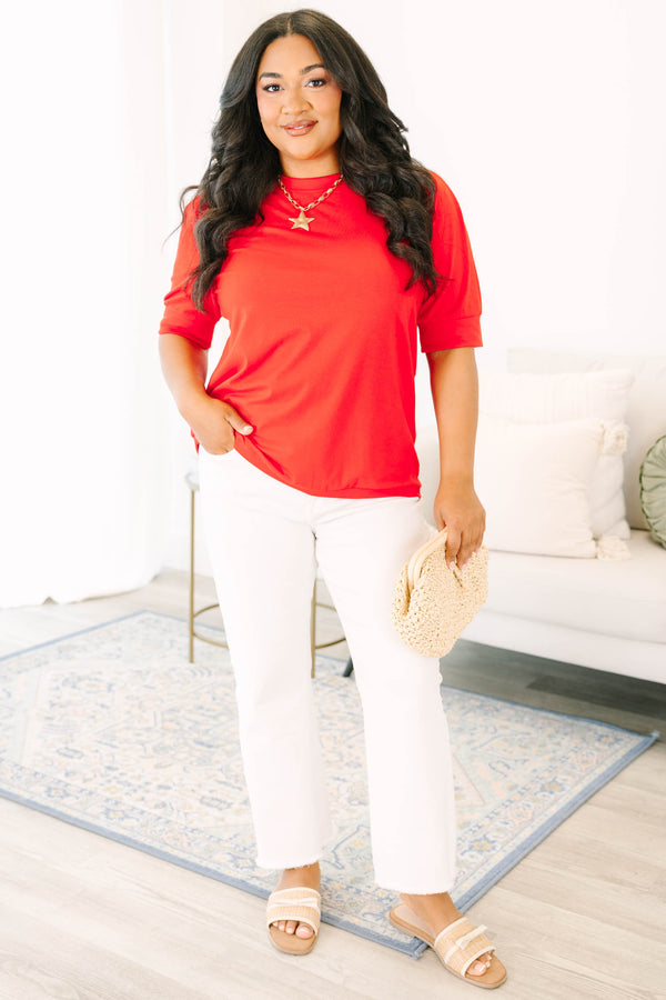 Plus size red short sleeve top with a relaxed fit