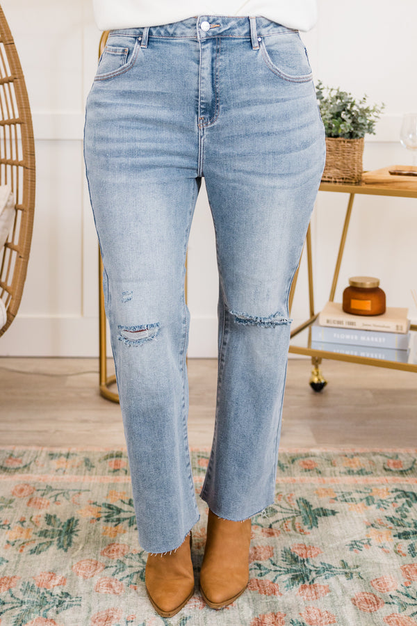 Chic Soul plus size clothing, light wash straight leg denim jeans with raw hem with hole on knees with light distressing
