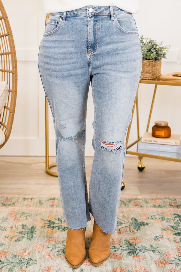 Chic Soul plus size clothing, light wash straight leg denim jeans with raw hem with hole on knees with light distressing