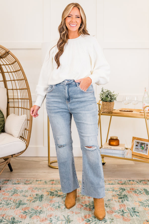 Chic Soul plus size clothing, light wash straight leg denim jeans with raw hem with hole on knees with light distressing