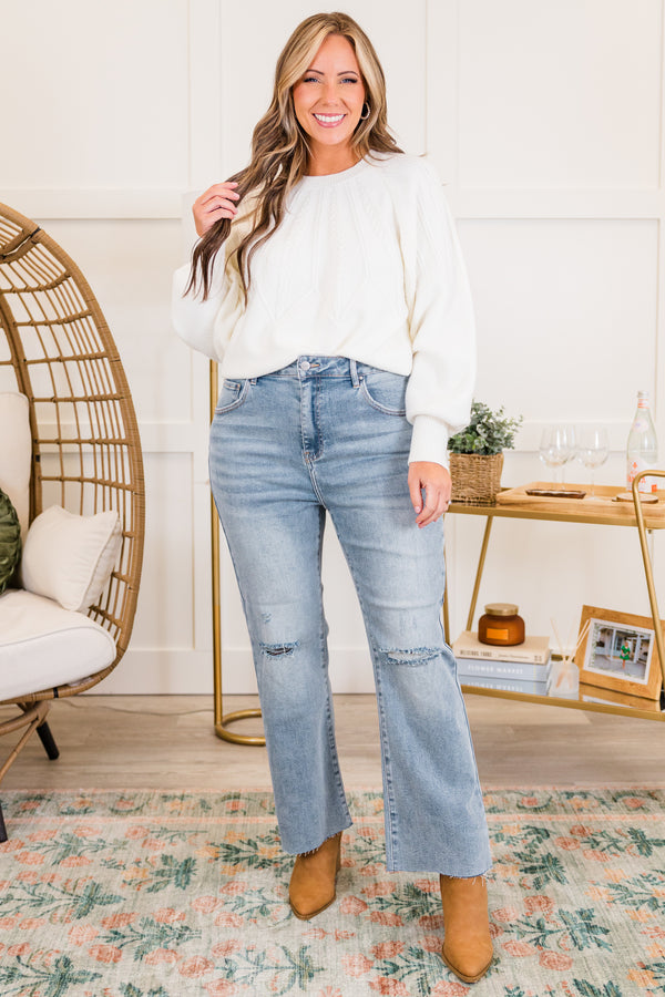 Chic Soul plus size clothing, light wash straight leg denim jeans with raw hem with hole on knees with light distressing