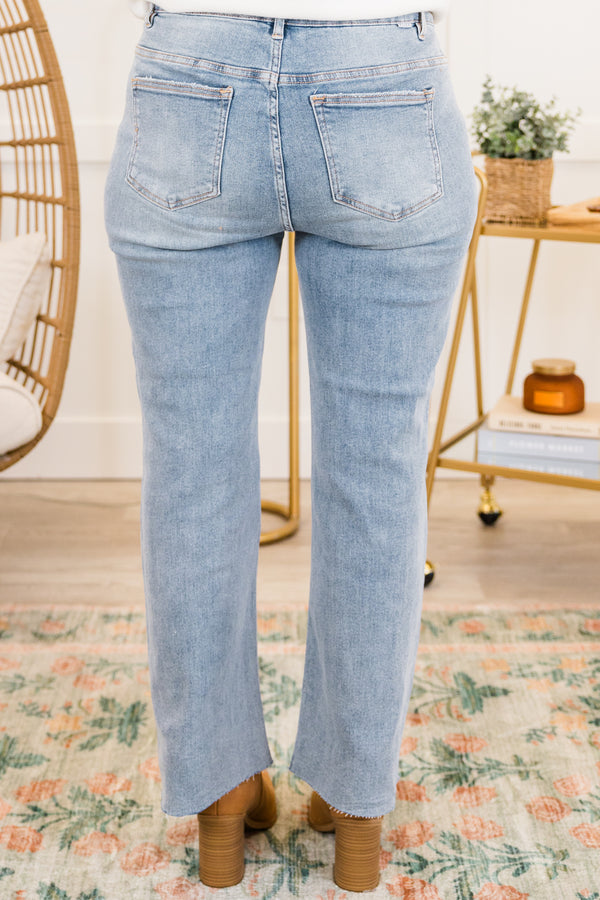Chic Soul plus size clothing, light wash straight leg denim jeans with raw hem with hole on knees with light distressing