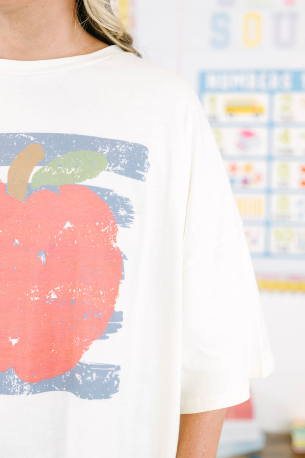 Plus Size ivory oversized boyfriend tee with a large red apple graphic 