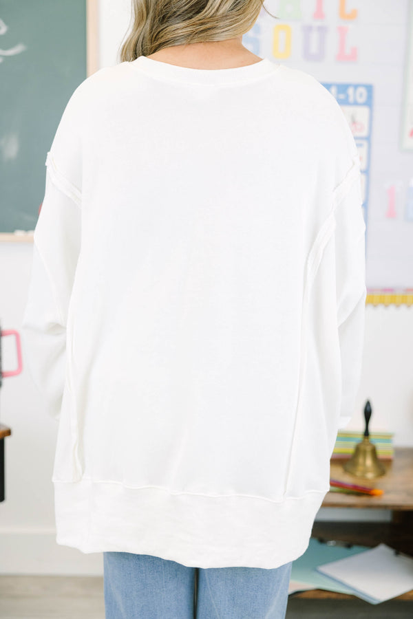 Plus size ivory sweatshirt with a distressed apple graphic.
