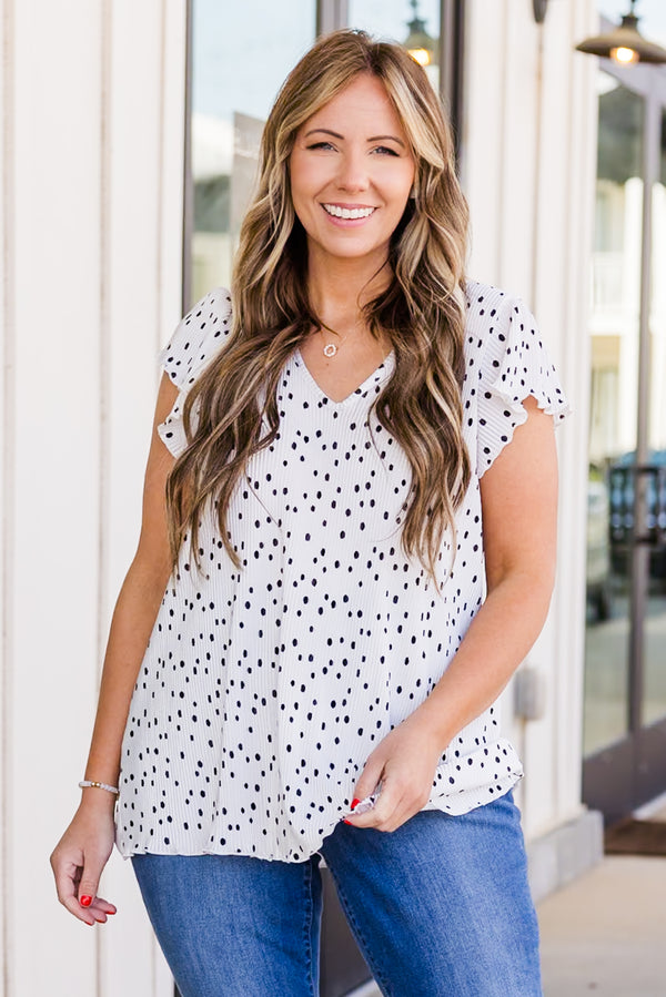 Chic Soul plus size clothing, ivory short sleeve top with ruffle sleeves with v neckline with black dotted print