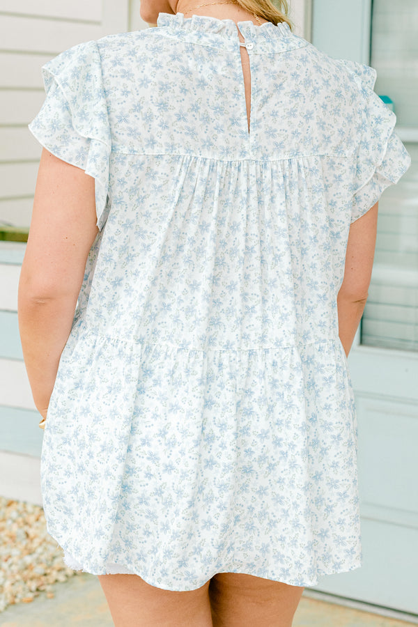 Chic Soul plus size clothing, short-flutter-sleeve blue and white floral top with a ruffled mock neck and a subtle ruffled tier