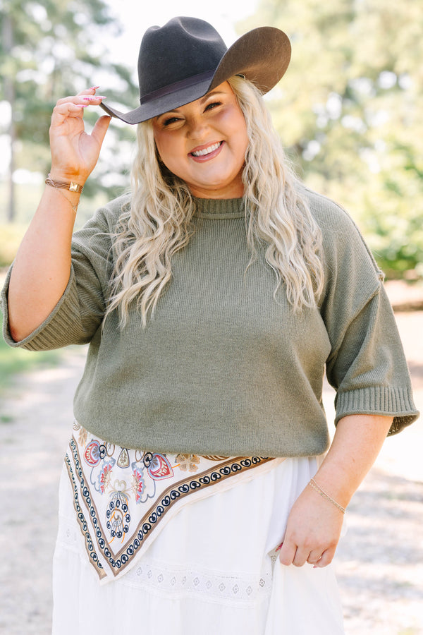 Plus Size olive green knit sweater with a crew neckline and elbow-length sleeves.