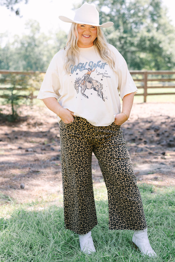 Plus Size wide leg jeans in a dark leopard print denim with a raw hem.
