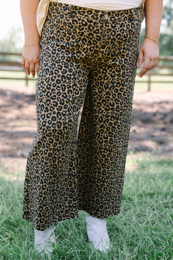 Plus Size wide leg jeans in a dark leopard print denim with a raw hem.