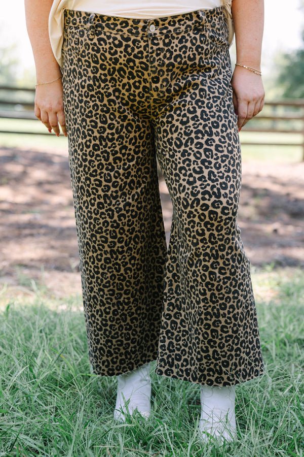 Plus Size wide leg jeans in a dark leopard print denim with a raw hem.