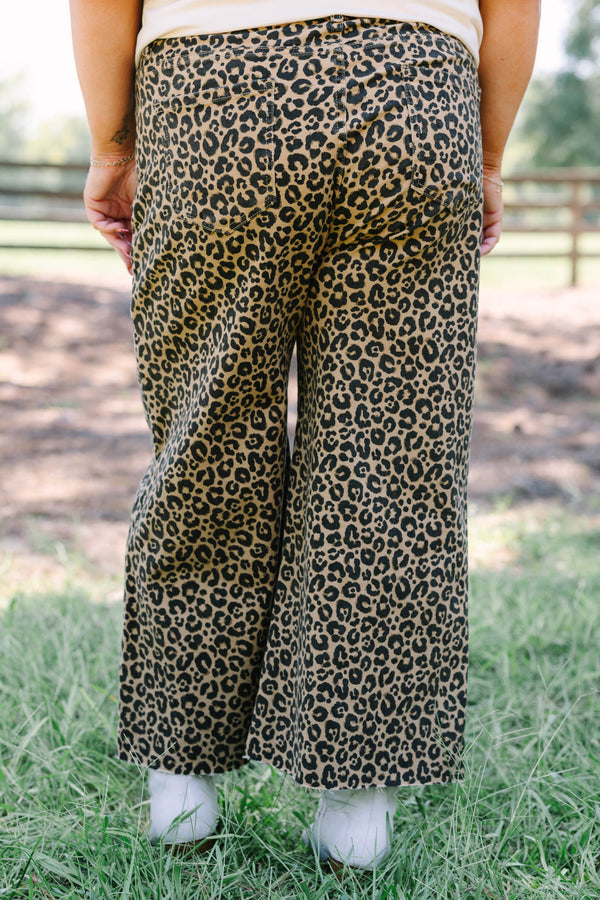 Plus Size wide leg jeans in a dark leopard print denim with a raw hem.