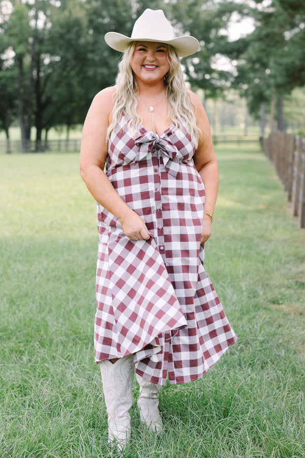 Plus Size brown and white gingham midi dress with a tie-front bodice and button-down front.