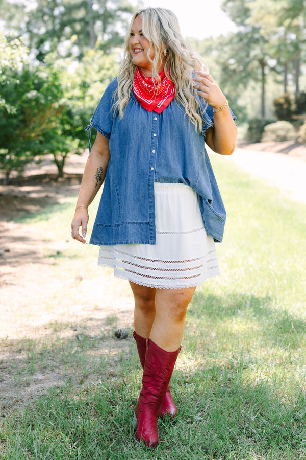 Plus Size denim tunic with short tie-sleeves, button-down front, and a relaxed fit.