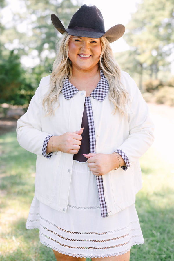 Plus Size cream cotton jacket with a gingham collar and cuffs over a matching white eyelet skirt.